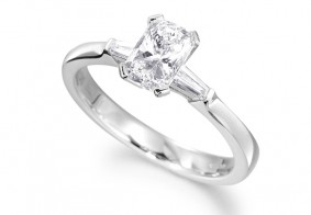 Phoenix Cut™ diamond ring set with tapered baguette shoulder diamonds